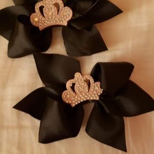 2 black pigtail hair bows